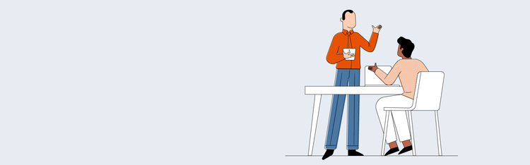 employees looking at a laptop