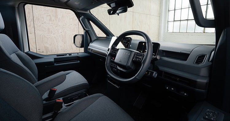 Kia PV5 Cargo van front interior view available on a novated lease through Maxxia in Australia.