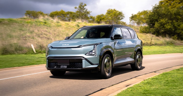 BYD ATTO exterior front view on a highway. Contact Maxxia for BYD ATTO novated lease today.