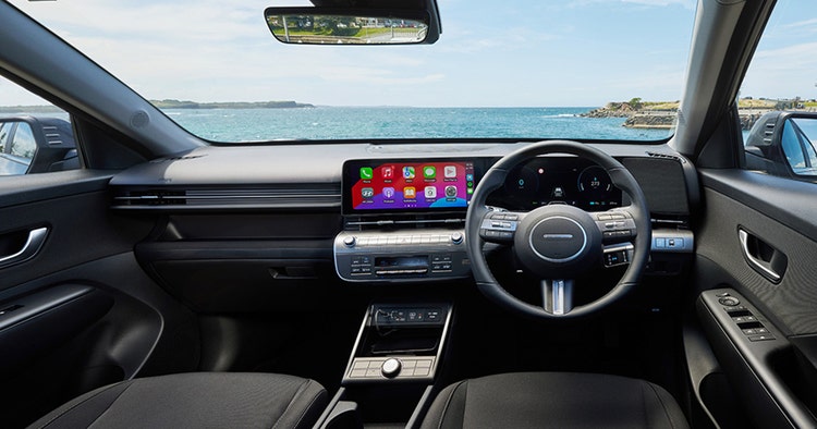 The dashboard view inside Hyundai KONA electric available on a novated lease through Maxxia in Australia.