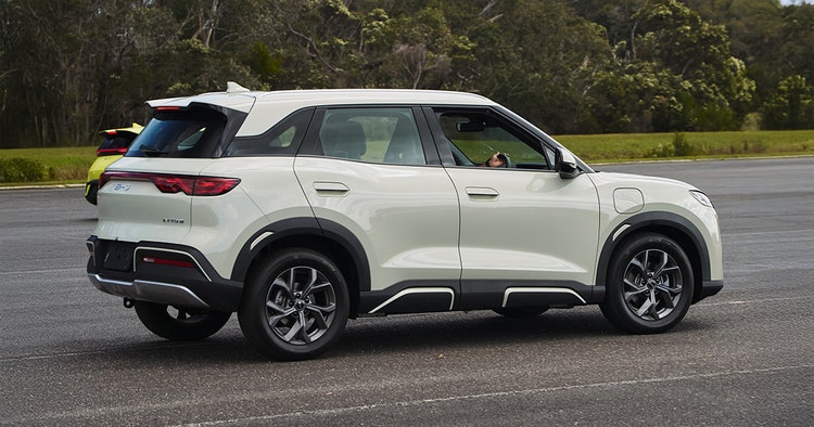 BYD ATTO 2 side exterior view on a road available for a novated lease in Australia with Maxxia