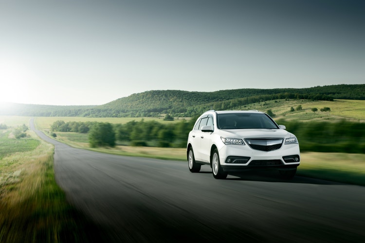 White SUV drive