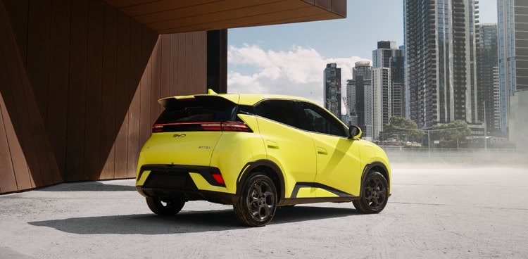 BYD ATTO 1 rear exterior view next to a building available for a novated lease in Australia with Maxxia
