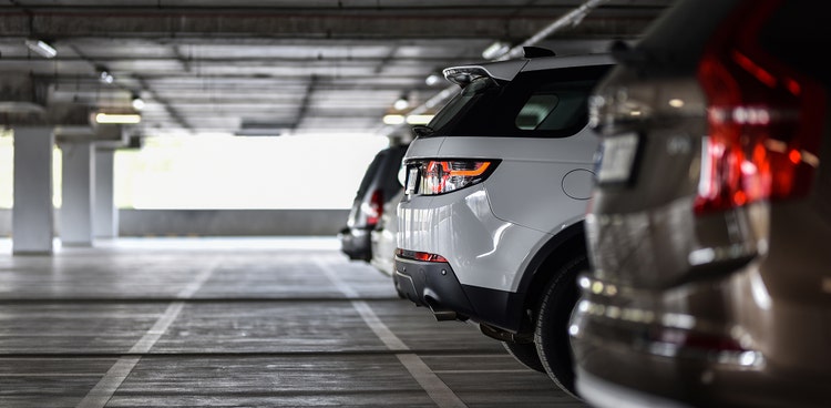 An employer's provided car park building filled with employees cars with car parking cost that could be eligible for salary packaging.