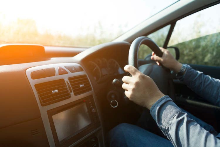 View from behind the steering wheel. Find out how you could save on tax through Maxxia salary packaging and novated leasing.