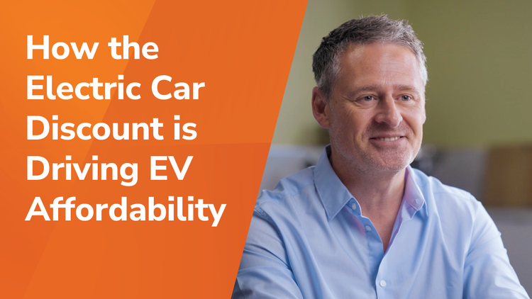 How the electric car discount is driving EV affordability title and a man smiling.