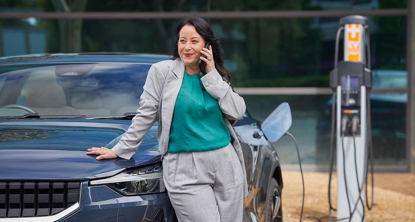 women charging her EV