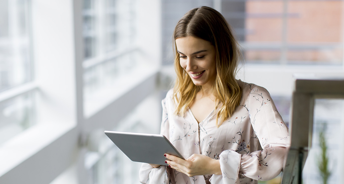 Woman holding i-pad