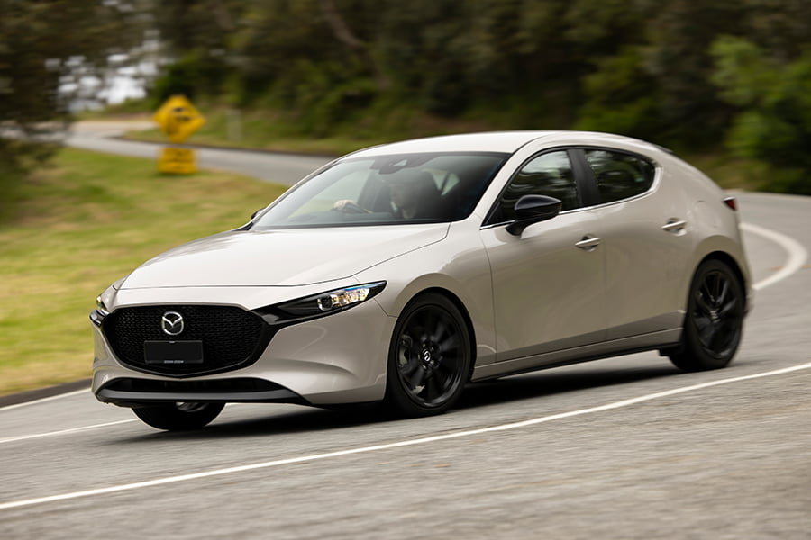 Mazda3 G25 Evolve SP 2023 side