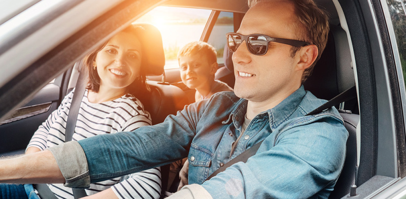 family in car