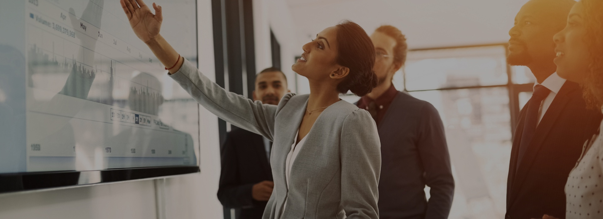 Woman pointing at board