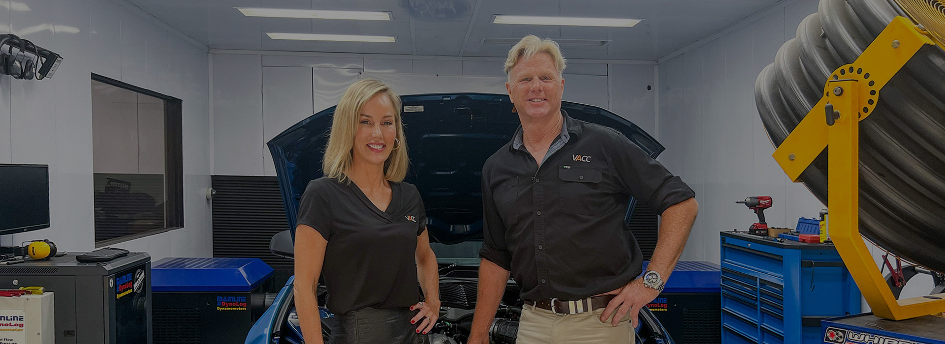 A man and a woman presenting cool cars - Maxxia Novated Leasing