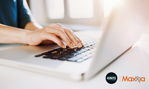 female typing on laptop