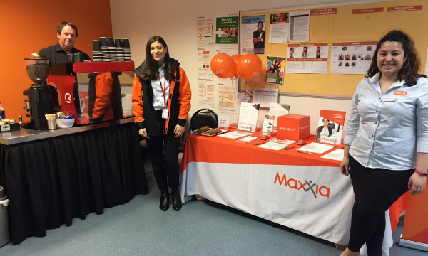Maxxia event stall with onsite staff