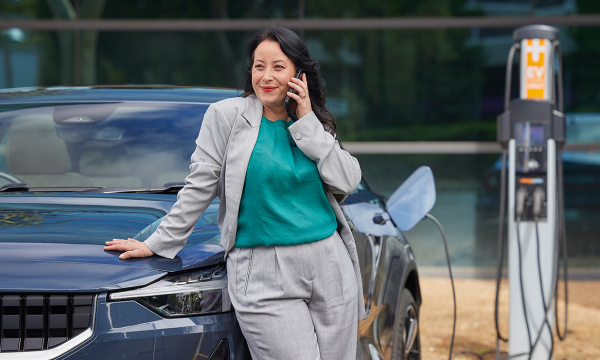 women charging her EV