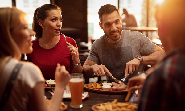 Friends enjoying a pub meal