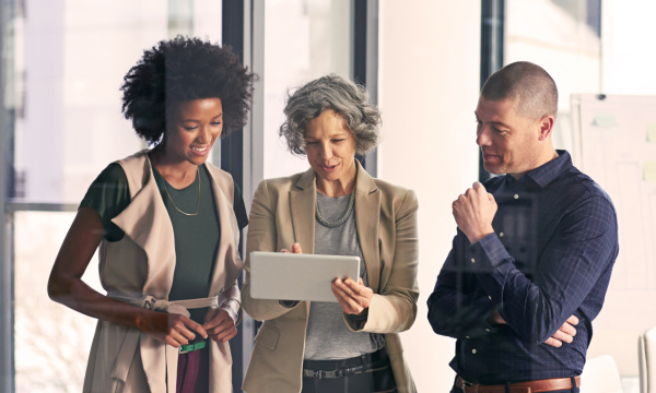 people chatting in a workplace