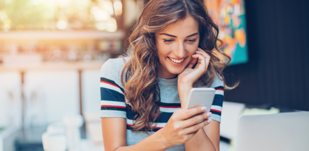 woman looking at phone