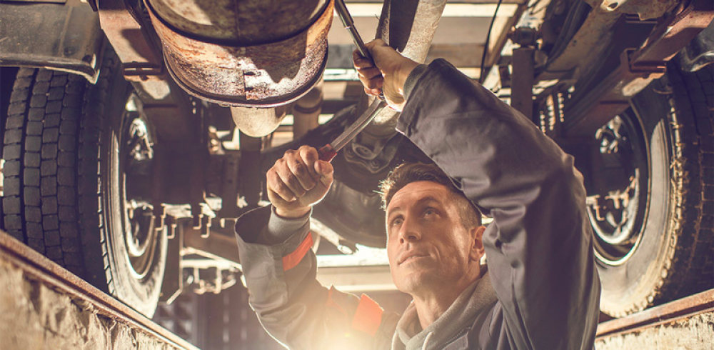 mechanic working on car