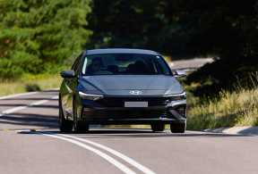 Hyundai i30 Sedan Hybrid 2024 on road