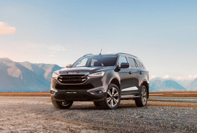 2024 Isuzu MU-X SUV parked in scenery 